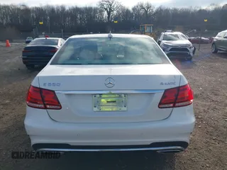 2014 Mercedes-Benz E 550 Sport with VIN WDDHF9BB5EA949457, listed as a IAAI auction lot 41128583 with 99,248 mi miles and . Bid and sale history available at DreamBid. Image 16.
