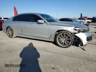 2018 BMW 7 Series 750i with VIN WBA7F0C57JGM23653, listed as a Copart auction lot 43462555 with 62,853 mi miles and Salvage Title. Bid and sale history available at carsss.com. Image 4.