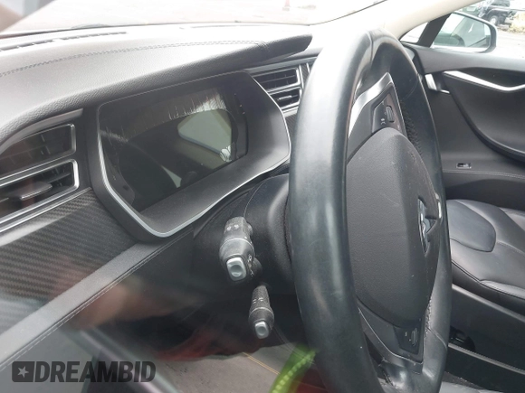 2014 Tesla Model S 60 with VIN 5YJSA1S13EFP53662, listed as a IAAI auction lot 42249930 with Not provided miles and . Bid and sale history available at DreamBid. Image 7.