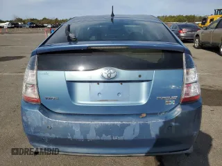 2005 Toyota Prius z VIN JTDKB20U753032936, wystawiony jako Copart lot #52772755 z przebiegiem 144 551 mil mil oraz Czysty tytuł • Clean title. Historia ofert i sprzedaży dostępna na DreamBid. Obrazek 6.