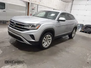2023 Volkswagen Atlas SE z VIN 1V2KC2CA6PC210593, wystawiony jako IAAI lot #41957633 z przebiegiem 34 801 mil mil oraz . Historia ofert i sprzedaży dostępna na DreamBid. Obrazek 2.