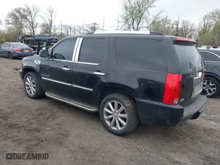 2009 Cadillac Escalade with VIN 1GYFK23219R102455, listed as a IAAI auction lot 42094042 with 238,407 mi miles. Bid and sale history available at carsss.com. Image 3.