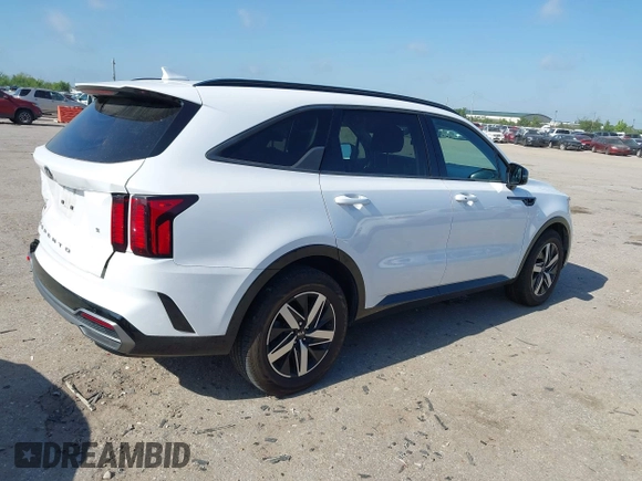 2021 Kia Sorento S with VIN 5XYRL4LC1MG002786, listed as a IAAI auction lot 42253503 with 90,893 mi miles and . Bid and sale history available at DreamBid. Image 4.