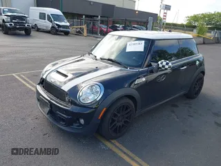 2013 MINI Hardtop S with VIN WMWSV3C53DT477574, listed as a IAAI auction lot 42385383 with 81,312 mi miles and . Bid and sale history available at DreamBid. Image 2.
