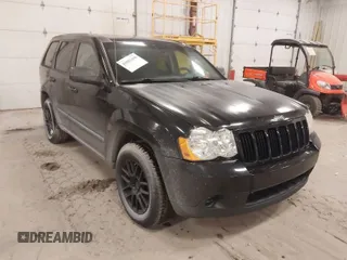 2008 Jeep Grand Cherokee Laredo with VIN 1J8GR48K08C138979, listed as a IAAI auction lot 41081490 with 191,733 mi miles. Bid and sale history available at carsss.com. Image 1.