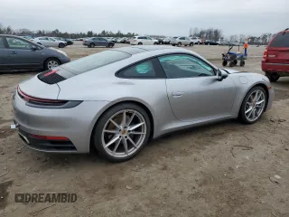 2022 Porsche 911 Carrera with VIN WP0AA2A98NS205474, listed as a Copart auction lot 40023494 with 9,889 mi miles. Bid and sale history available at carsss.com. Image 3.