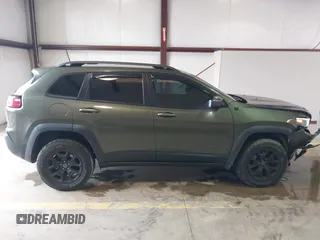 2020 Jeep Cherokee Trailhawk Elite with VIN 1C4PJMBN2LD538076, listed as a IAAI auction lot 42219282 with 53,773 mi miles and . Bid and sale history available at DreamBid. Image 13.