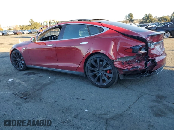 2015 Tesla Model S 85D with VIN 5YJSA1E40FF114095, listed as a Copart auction lot 84114284 with 114,882 mi miles and Salvage Title. Bid and sale history available at carsss.com. Image 2.