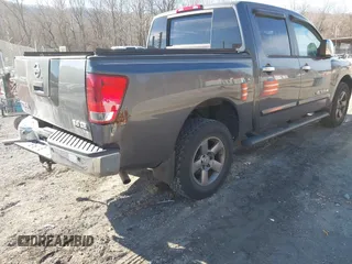 2005 Nissan Titan SE with VIN 1N6BA07B25N532466, listed as a IAAI auction lot 41437704 with 142,762 mi miles and . Bid and sale history available at DreamBid. Image 4.