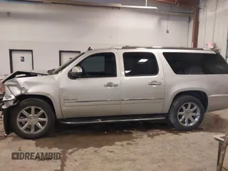 2011 GMC Yukon XL Denali z VIN 1GKS2MEF8BR338725, wystawiony jako IAAI lot #41238933 z przebiegiem 289 109 mil mil oraz . Historia ofert i sprzedaży dostępna na DreamBid. Obrazek 14.