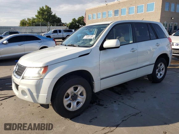 2012 Suzuki Grand Vitara Premium z VIN JS3TD0D64C4100245, wystawiony jako Copart lot #71365134 z przebiegiem 100 501 mil mil oraz Szkoda całkowita • Salvage title. Historia ofert i sprzedaży dostępna na DreamBid. Obrazek 1.