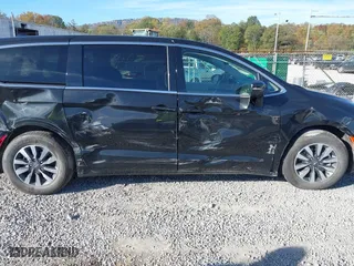 2023 Chrysler Pacifica Hybrid Touring L with VIN 2C4RC1L79PR592477, listed as a IAAI auction lot 40823333 with 8,729 mi miles. Bid and sale history available at carsss.com. Image 13.