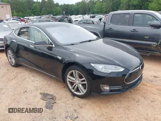 2014 Tesla Model S 60 z VIN 5YJSA1H10EFP34137, wystawiony jako IAAI lot #42311565 z przebiegiem Nie podano mil oraz . Historia ofert i sprzedaży dostępna na DreamBid. Obrazek 1.