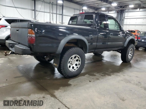 2004 Toyota Tacoma with VIN 5TEWN72N14Z424211, listed as a Copart auction lot 51815615 with 203,415 mi miles and Salvage Title. Bid and sale history available at DreamBid. Image 3.