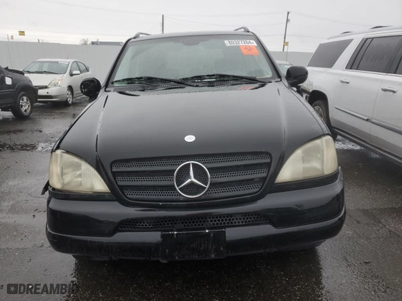 2001 Mercedes-Benz M-Class with VIN 4JGAB54E51A273024, listed as a Copart auction lot 80327264 with 211,120 mi miles and Salvage Title. Bid and sale history available at carsss.com. Image 5.