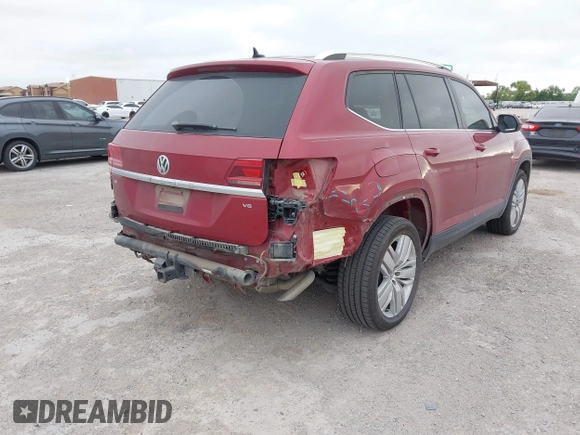 2019 Volkswagen Atlas SE with VIN 1V2WR2CA4KC606661, listed as a IAAI auction lot 42581054 with 89,079 mi miles and . Bid and sale history available at DreamBid. Image 6.