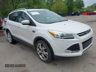 2016 Ford Escape Titanium with VIN 1FMCU9J96GUB97564, listed as a IAAI auction lot 42137663 with 269,009 mi miles. Bid and sale history available at carsss.com. Image 1.