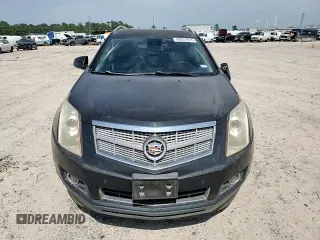 2012 Cadillac SRX Premium Collection z VIN 3GYFNCE39CS526425, wystawiony jako Copart lot #60557615 z przebiegiem 161 217 mil mil oraz Szkoda całkowita • Salvage title. Historia ofert i sprzedaży dostępna na DreamBid. Obrazek 15.