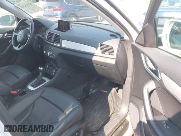 2017 Audi Q3 Premium z VIN WA1ECCFS7HR009402, wystawiony jako IAAI lot #42462248 z przebiegiem 46 536 mil mil oraz . Historia ofert i sprzedaży dostępna na DreamBid. Obrazek 5.