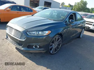 2016 Ford Fusion Titanium with VIN 3FA6P0K90GR188049, listed as a IAAI auction lot 42575477 with 239,414 mi miles and . Bid and sale history available at DreamBid. Image 21.