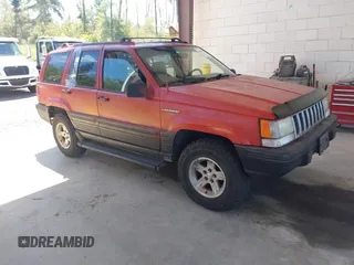 1995 Jeep Grand Cherokee Laredo with VIN 1J4GZ58Y6SC508349, listed as a IAAI auction lot 42630804 with 223,519 mi miles and . Bid and sale history available at DreamBid. Image 1.