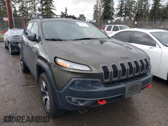 2015 Jeep Cherokee Trailhawk with VIN 1C4PJMBB5FW510514, listed as a IAAI auction lot 41492111 with 98,482 mi miles and . Bid and sale history available at DreamBid. Image 1.