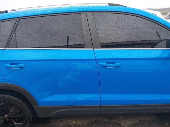 2023 Volkswagen Taos SE z VIN 3VVNX7B28PM305652, wystawiony jako IAAI lot #41892522 z przebiegiem 50 644 mil mil oraz . Historia ofert i sprzedaży dostępna na DreamBid. Obrazek 13.