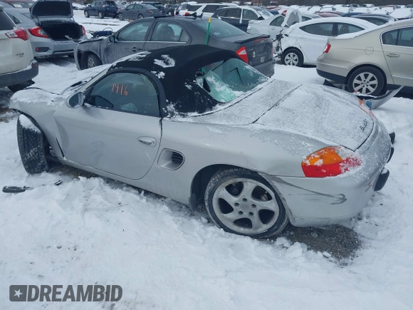 2000 Porsche Boxster z VIN WP0CA2984YU621650, wystawiony jako IAAI lot #41381416 z przebiegiem 71 514 mil mil oraz . Historia ofert i sprzedaży dostępna na DreamBid. Obrazek 3.