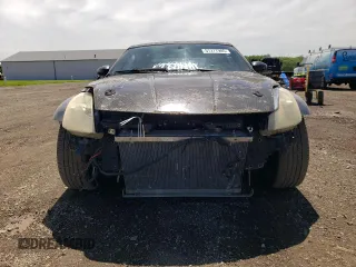 2005 Nissan 350Z Enthusiast z VIN JN1AZ34DX5M607390, wystawiony jako Copart lot #57277905 z przebiegiem 97 629 mil mil oraz Tytuł czysty. Historia ofert i sprzedaży dostępna na DreamBid. Obrazek 5.