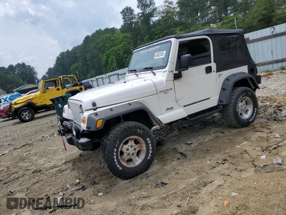 2000 Jeep Wrangler Sahara with VIN 1J4FA59SXYP760278, listed as a Copart auction lot 60402485 with 192,161 mi miles and Salvage title. Bid and sale history available at DreamBid. Image 1.