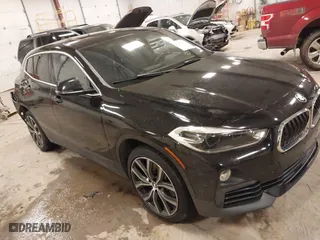 2020 BMW X2 xDrive28i with VIN WBXYJ1C07L5R28321, listed as a IAAI auction lot 41409807 with 41,296 mi miles. Bid and sale history available at carsss.com. Image 1.