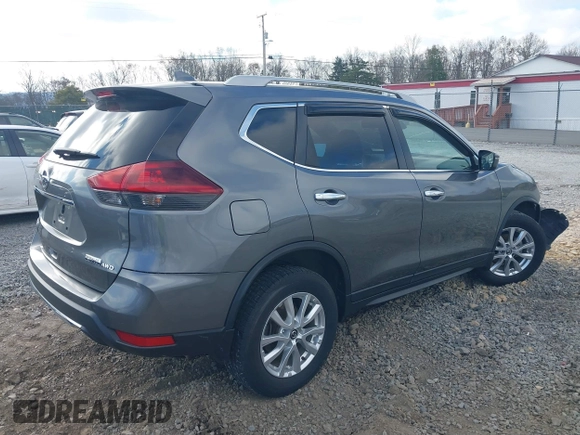2019 Nissan Rogue SV with VIN 5N1AT2MV7KC701886, listed as a IAAI auction lot 40798587 with 51,491 mi miles and . Bid and sale history available at carsss.com. Image 4.