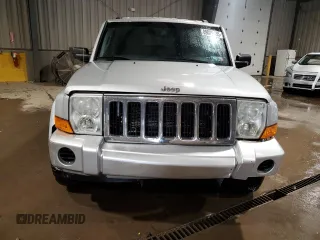 2009 Jeep Commander Sport z VIN 1J8HG48K09C526337, wystawiony jako Copart lot #89026135 z przebiegiem 194 514 mil mil oraz Szkoda całkowita • Salvage title. Historia ofert i sprzedaży dostępna na DreamBid. Obrazek 5.