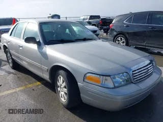 2008 Ford Crown Victoria LX z VIN 2FAFP74V28X132488, wystawiony jako IAAI lot #41586097 z przebiegiem 126 882 mil mil oraz . Historia ofert i sprzedaży dostępna na DreamBid. Obrazek 1.