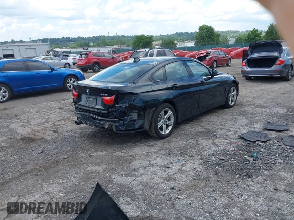 2015 BMW 4 Series 428i xDrive with VIN WBA4C9C52FD331620, listed as a IAAI auction lot 42556526 with 115,674 mi miles and . Bid and sale history available at DreamBid. Image 4.