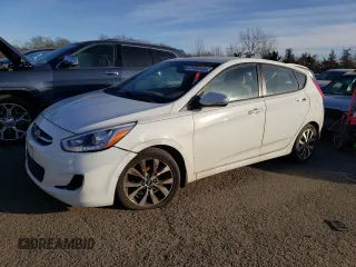 2015 Hyundai Accent Sport with VIN KMHCU5AE2FU217782, listed as a Copart auction lot 41446935 with 99,764 mi miles and Clean Title. Bid and sale history available at carsss.com. Image 1.