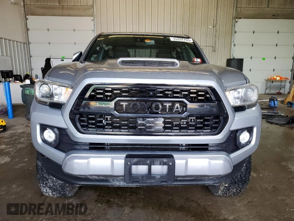 2020 Toyota Tacoma SR5 z VIN 5TFCZ5AN7LX222217, wystawiony jako Copart lot #45892765 z przebiegiem 79 098 mil mil oraz Szkoda całkowita • Salvage title. Historia ofert i sprzedaży dostępna na DreamBid. Obrazek 5.