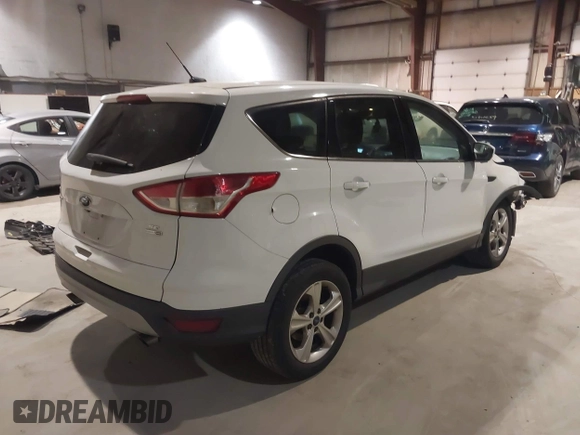 2016 Ford Escape SE with VIN 1FMCU9GX2GUB93968, listed as a IAAI auction lot 41711240 with 153,636 mi miles. Bid and sale history available at carsss.com. Image 4.