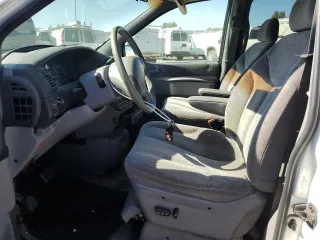 1998 Dodge Caravan LE with VIN 1B4GP54LXWB688630, listed as a Copart auction lot 74829544 with 209,157 mi miles and Salvage Title. Bid and sale history available at carsss.com. Image 7.