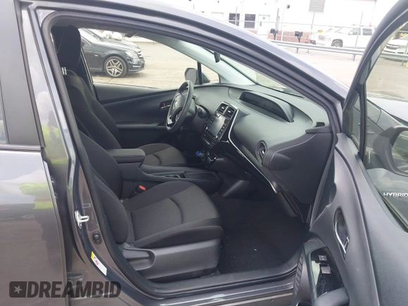 2021 Toyota Prius L Eco z VIN JTDKAMFU3M3152785, wystawiony jako IAAI lot #42501351 z przebiegiem 60 489 mil mil oraz . Historia ofert i sprzedaży dostępna na DreamBid. Obrazek 5.