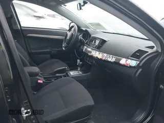 2014 Mitsubishi Lancer ES z VIN JA32U2FU7EU002071, wystawiony jako IAAI lot #42317104 z przebiegiem 159 858 mil mil oraz . Historia ofert i sprzedaży dostępna na DreamBid. Obrazek 5.