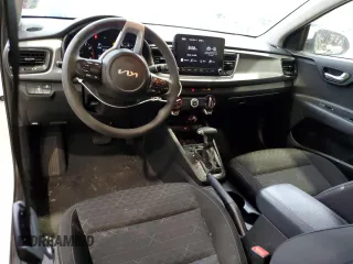 2023 Kia Rio LX with VIN 3KPA24ADXPE615843, listed as a Copart auction lot 47660125 with 27,841 mi miles and Salvage Title. Bid and sale history available at DreamBid. Image 8.