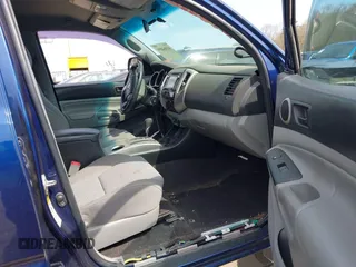2014 Toyota Tacoma with VIN 3TMLU4EN0EM153558, listed as a IAAI auction lot 41964890 with 140,864 mi miles and . Bid and sale history available at DreamBid. Image 5.