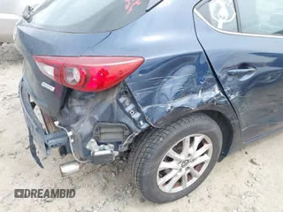 2014 Mazda 3 i Grand Touring with VIN JM1BM1M77E1133477, listed as a IAAI auction lot 41861051 with 124,377 mi miles and . Bid and sale history available at DreamBid. Image 19.