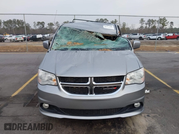 2017 Dodge Grand Caravan SXT with VIN 2C4RDGCG9HR677157, listed as a IAAI auction lot 41470342 with 66,611 mi miles and . Bid and sale history available at DreamBid. Image 12.