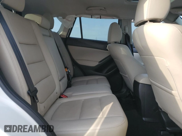 2014 Mazda CX-5 Grand Touring with VIN JM3KE4DYXE0377810, listed as a Copart auction lot 53071255 with 117,642 mi miles and Salvage Title. Bid and sale history available at DreamBid. Image 11.