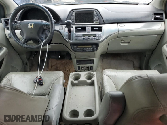 2006 Honda Odyssey EX-L z VIN 5FNRL38786B014188, wystawiony jako Copart lot #57140935 z przebiegiem Nie podano mil oraz Szkoda całkowita • Salvage title. Historia ofert i sprzedaży dostępna na DreamBid. Obrazek 8.