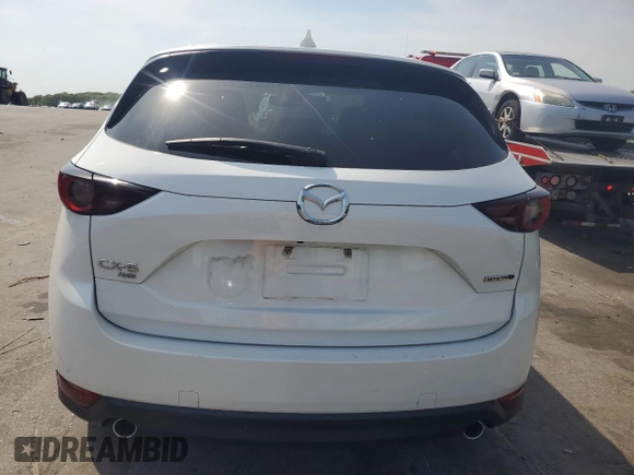2021 Mazda CX-5 Touring with VIN JM3KFBCM7M0386995, listed as a Copart auction lot 55255784 with 43,561 mi miles and Salvage Title. Bid and sale history available at carsss.com. Image 6.