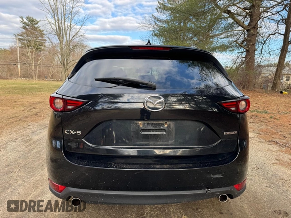 2020 Mazda CX-5 Grand Touring with VIN JM3KFADM8L0785373, listed as a Copart auction lot 50829175 with 135,736 mi miles and Clean Title. Bid and sale history available at DreamBid. Image 15.