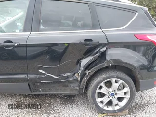 2014 Ford Escape Titanium with VIN 1FMCU9J95EUD60587, listed as a IAAI auction lot 42129854 with 155,559 mi miles and . Bid and sale history available at DreamBid. Image 6.